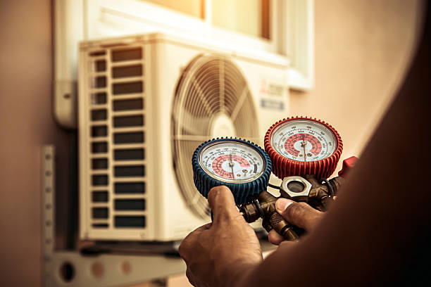 Professional Hvac technician working in Chisholm, ME